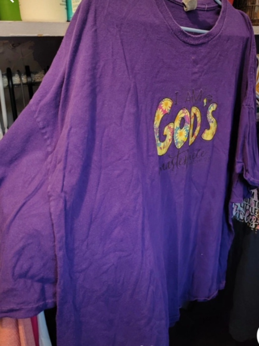 UNISEX- Purple T-Shirt.  Size 5X/ (US 62-64). Reads “I Am God’s Masterpiece”.